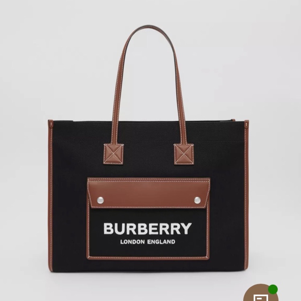 A Burberry medium two-tone canvas and leather freya tote.